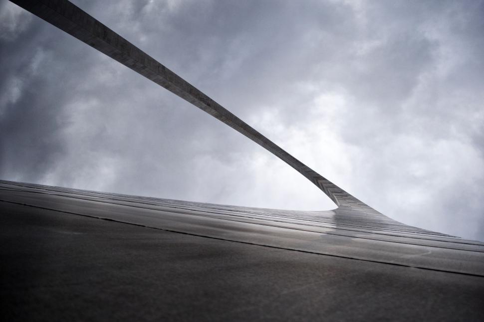 Free Image of Large Long Knife Sticking Out of Building 