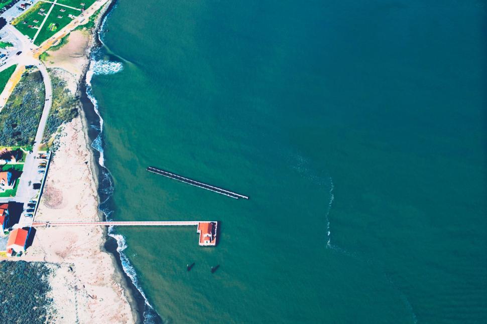 Free Image of Aerial View of Beach and Body of Water 