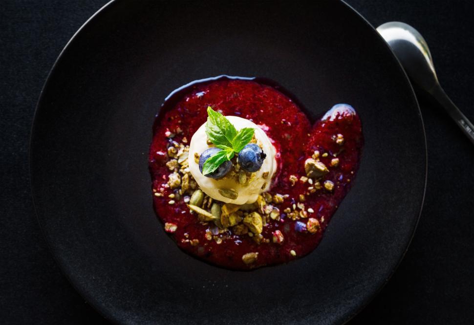 Free Image of Black Plate With Dessert and Spoon 