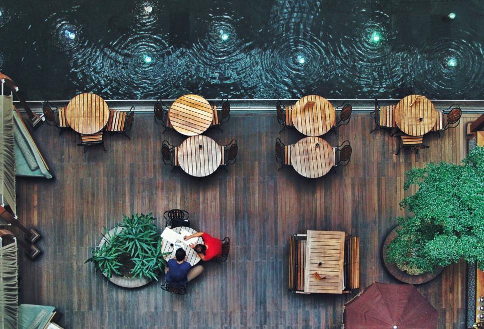 Free Image of Overhead View of Patio With Tables and Chairs 