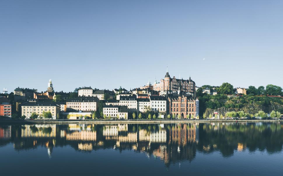 Free Image of Urban Cityscape Across Vast Waterway 