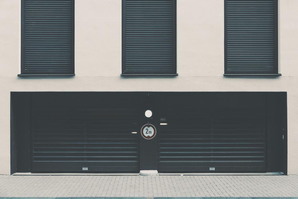 Free Image of Black and White Photo of a Garage Door 