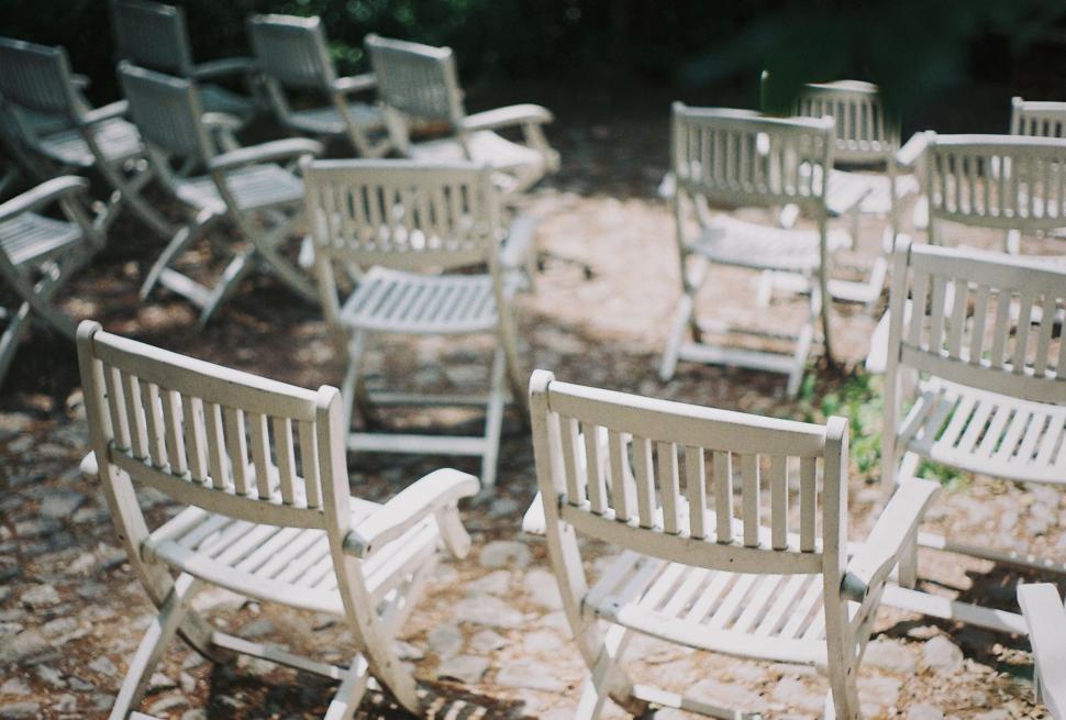 Free Image of Chairs Abandoned in Dirt 