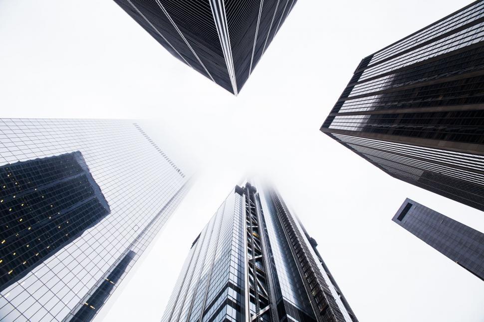 Free Image of Looking Up at Tall Buildings in a City 