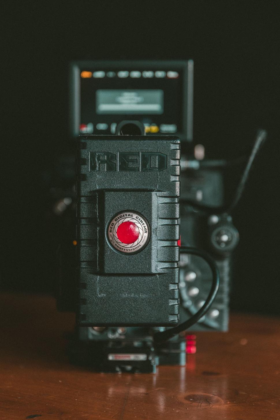 Free Image of Camera on Wooden Table 