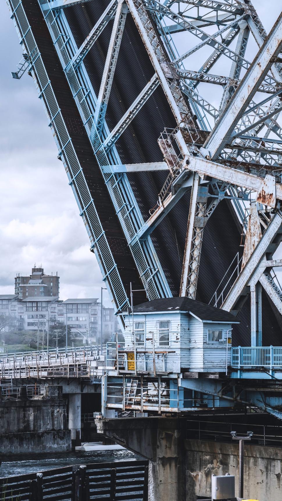 Free Image of Train Crossing Bridge Over River 