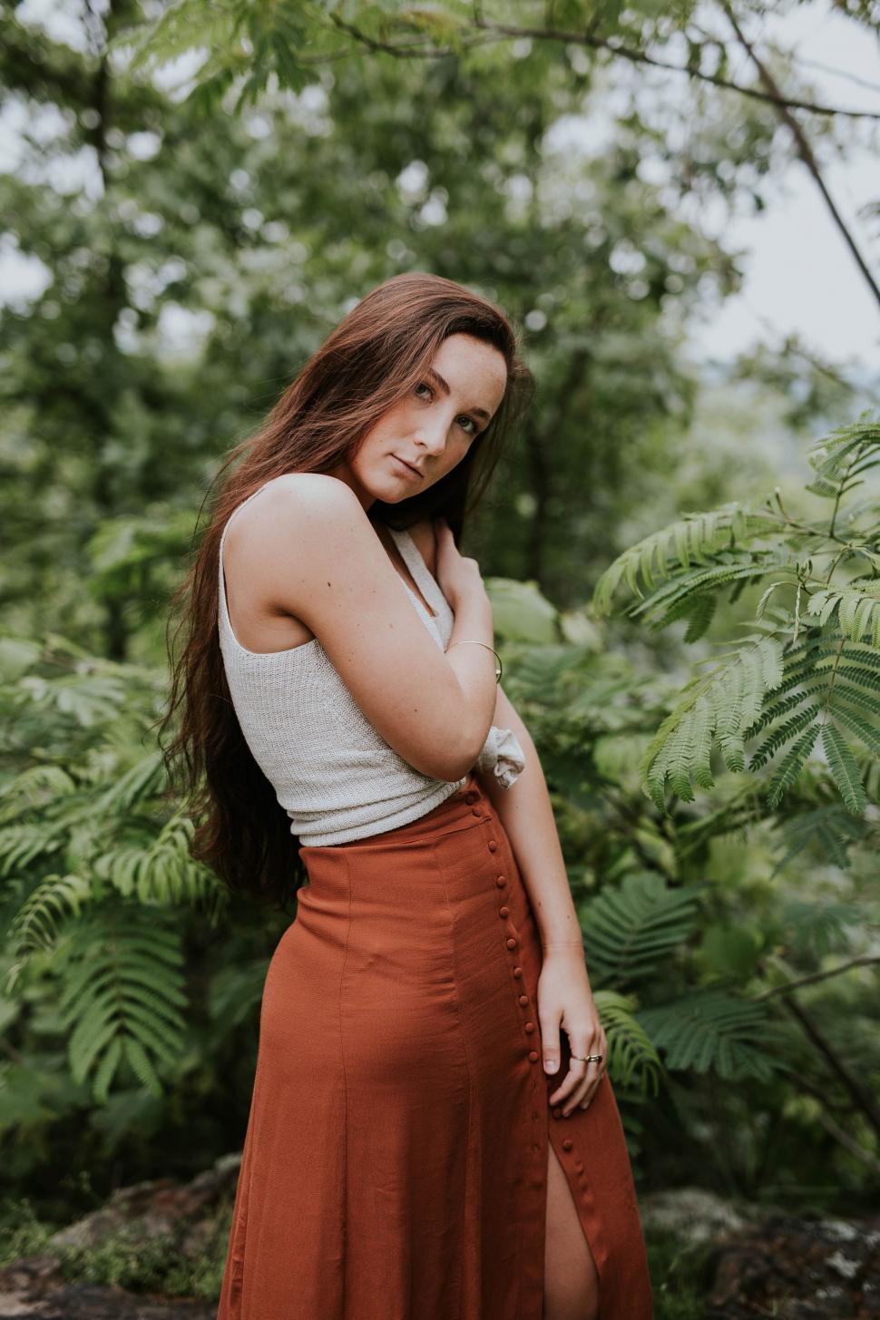 Free Image of Woman in Long Skirt Posing for Picture 