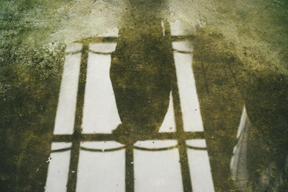Free Image of Shadow of a Chair on the Ground 