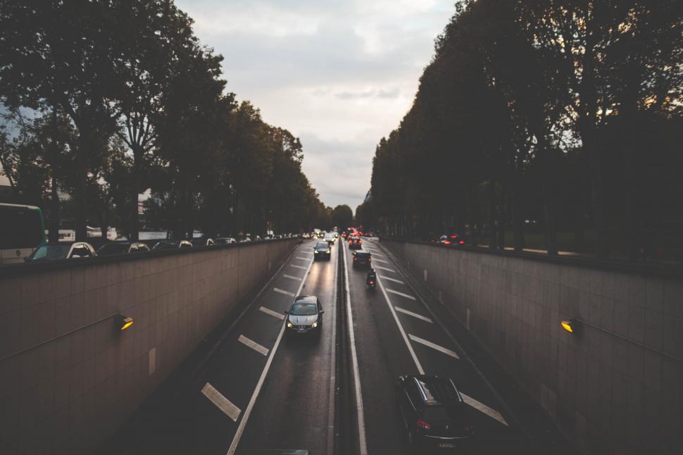 Free Image of Cars Driving Down a Street 