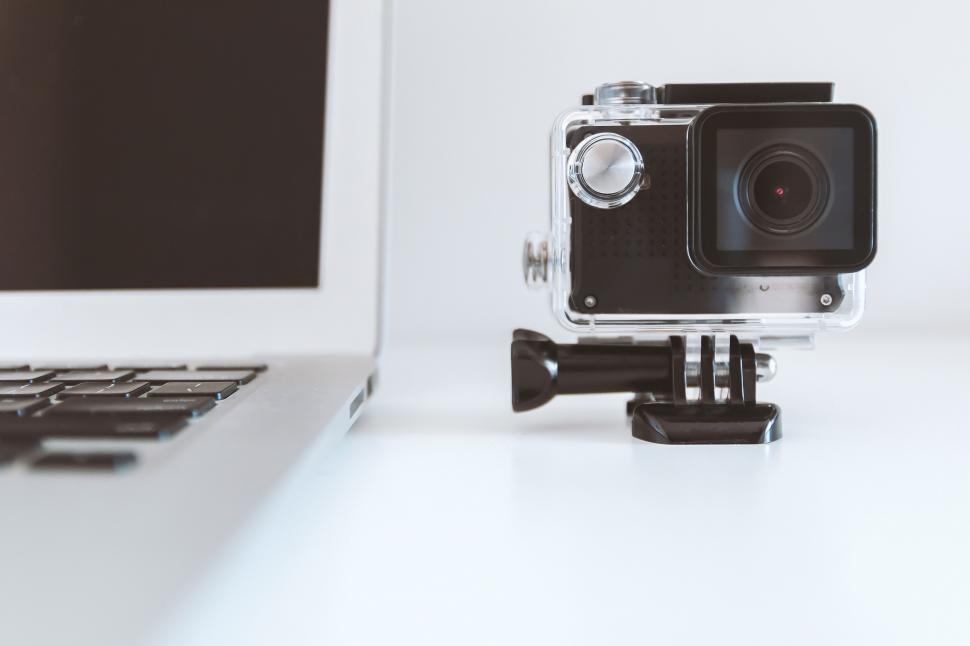 Free Image of Camera on Top of Laptop Computer 