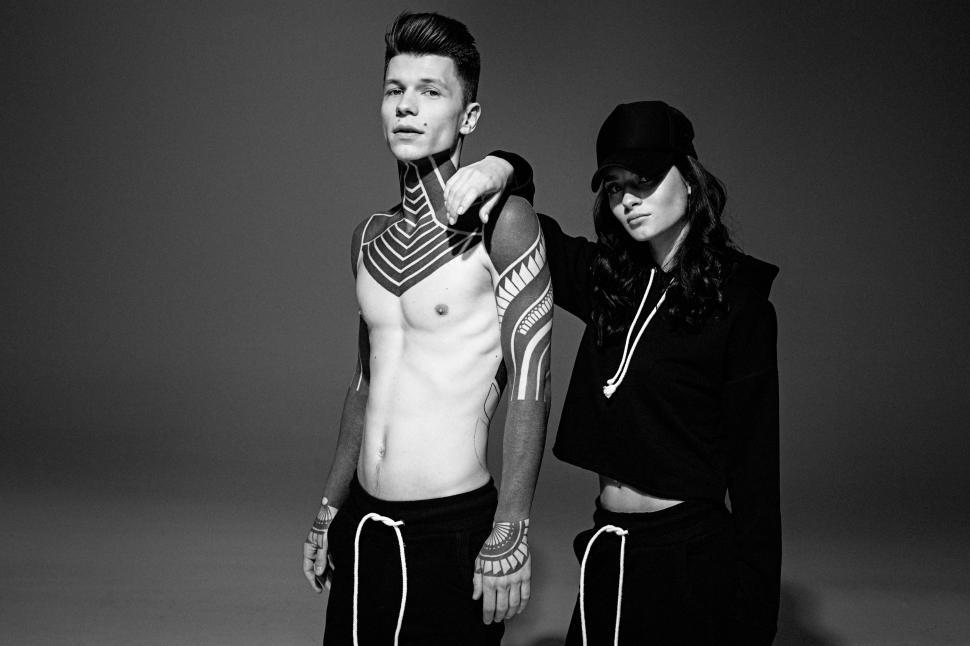 Free Image of A Man and a Woman Standing Next to Each Other 