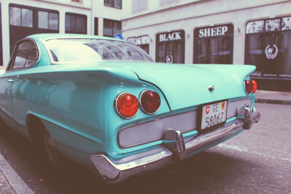 Free Image of Blue Car Parked on Side of Road 