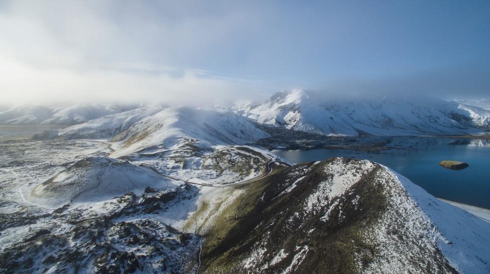 Free Image of Snow Covered Mountain With Lake 