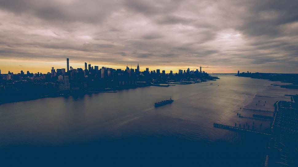 Free Image of Aerial View of City and Body of Water 