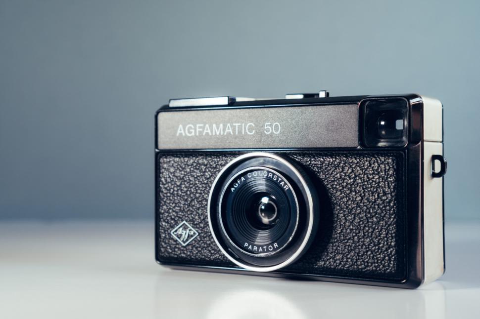 Free Image of Antique Camera on Wooden Table 