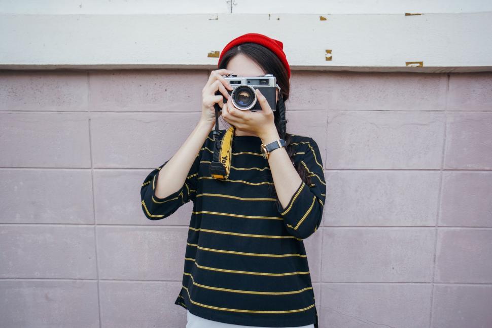 Free Image of Woman Taking a Selfie With Camera 
