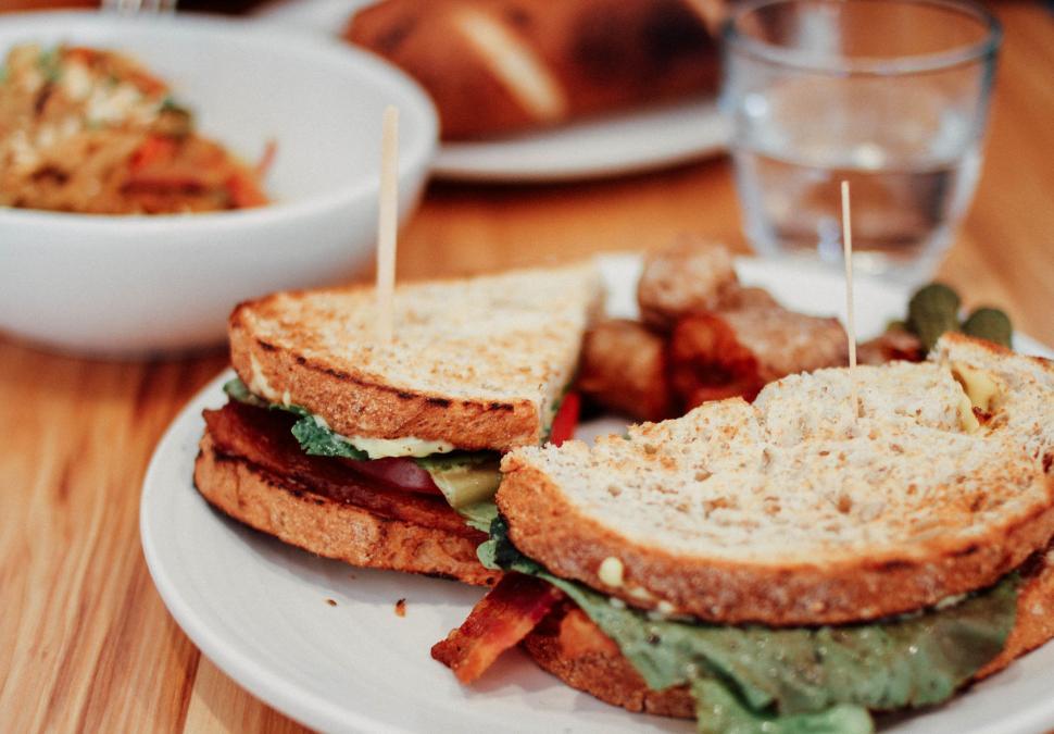 Free Image of White Plate With Cut-in-Half Sandwich 