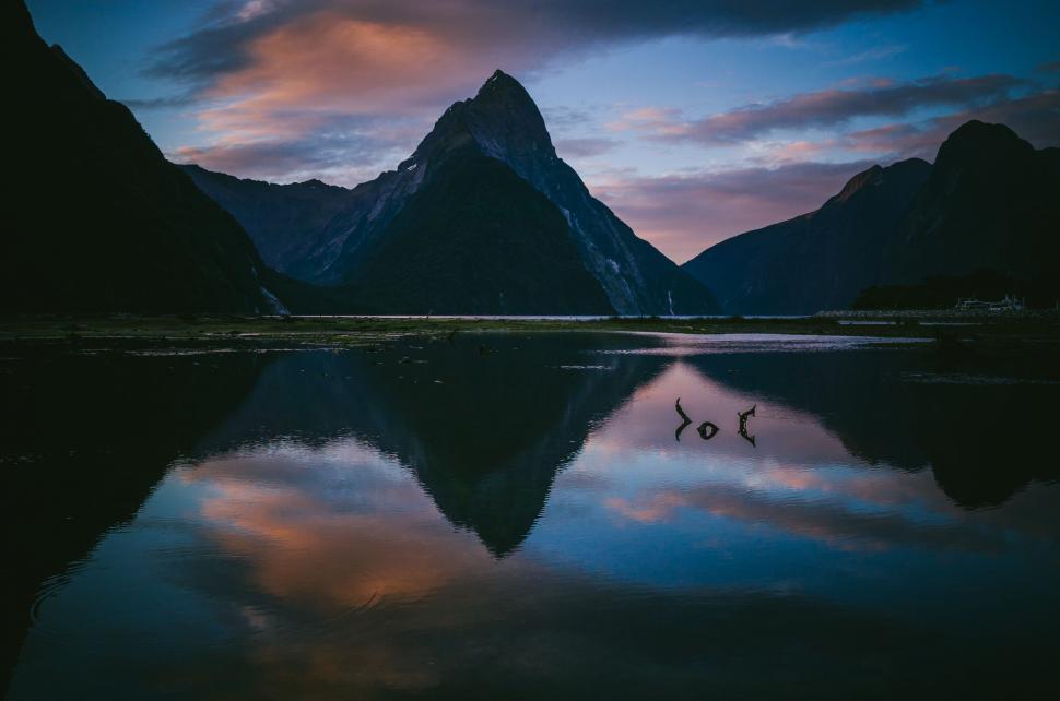 Free Image of Lake With Mountains and Cloudy Sky 