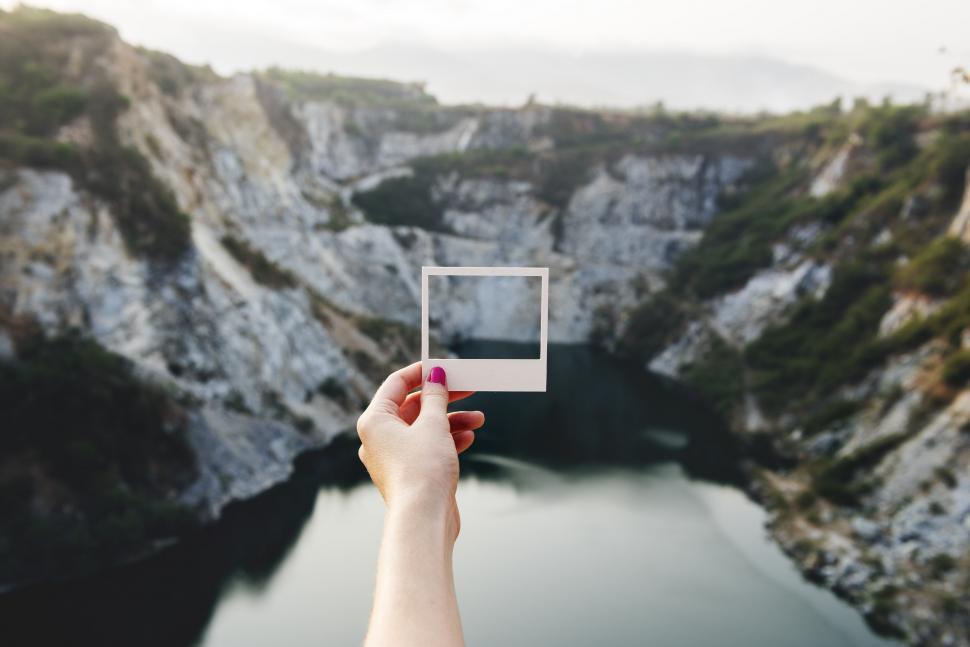 Free Image of Person Holding Small Square Object 