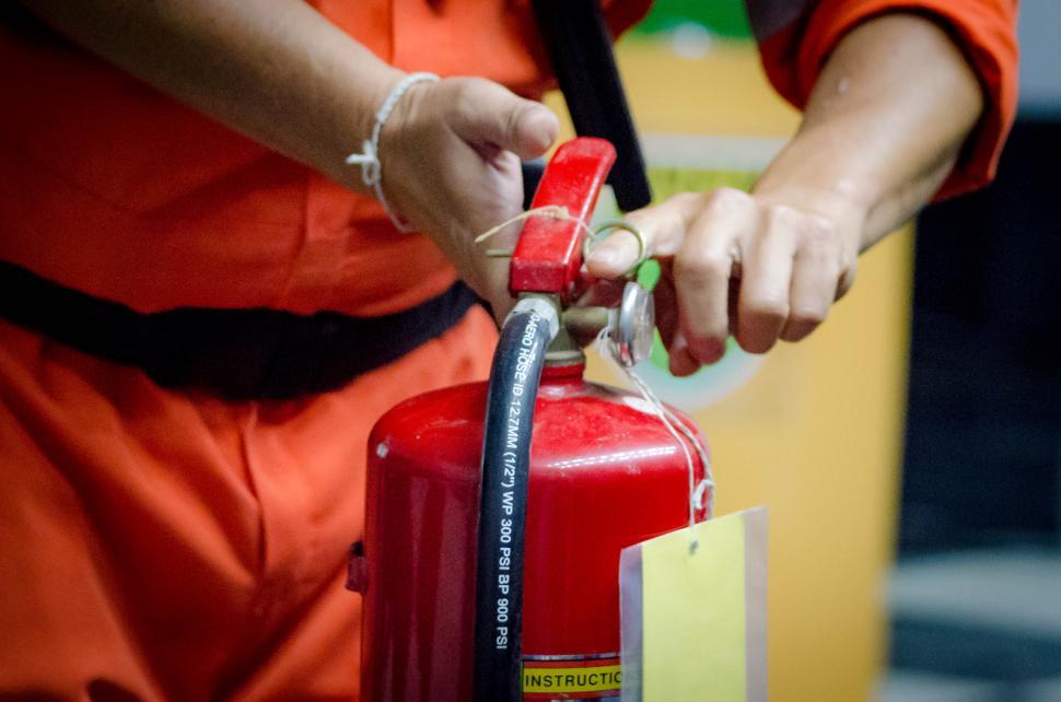 Free Image of Pull the fire extinguisher pin 