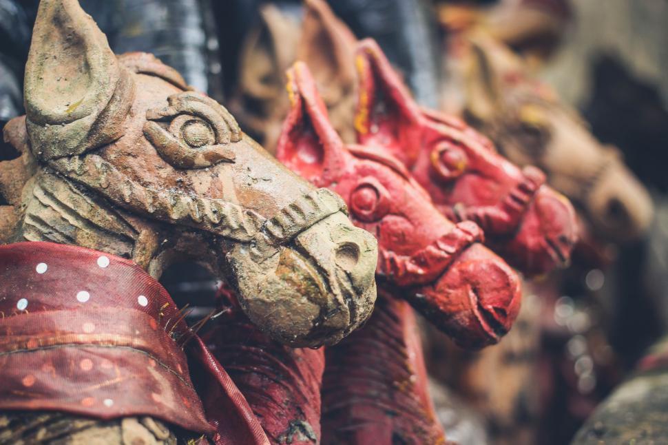 Free Image of Close Up of a Group of Masks on Display 