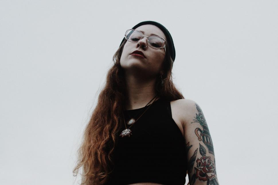 Free Image of Woman With Long Hair Wearing Black Tank Top 
