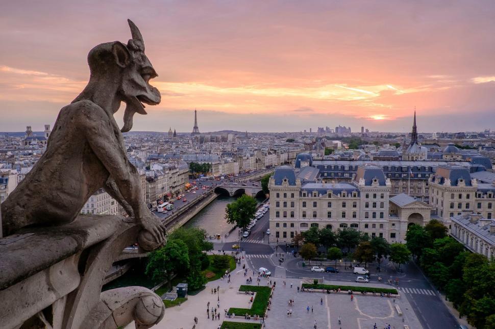 Free Image of Gargoyle Statue Overlooks Cityscape 