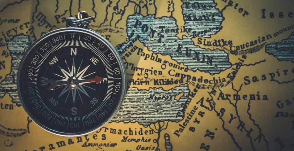 Free Image of Compass on Top of Map 