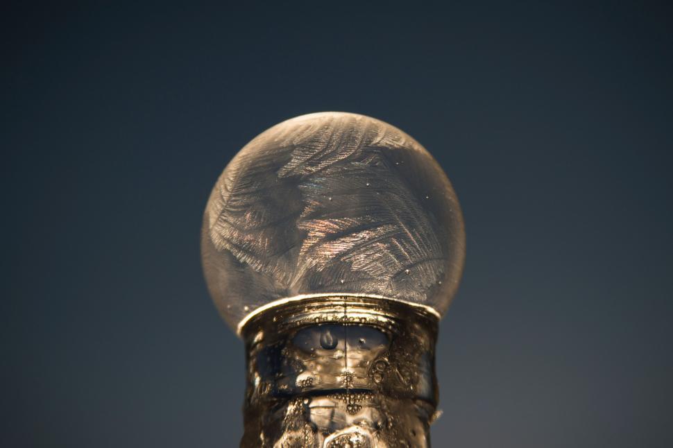 Free Image of Close Up of Snow Globe With Sky Background 