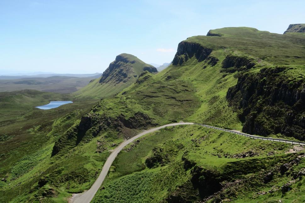 Free Image of Scenic View of a Winding Road in the Mountains 