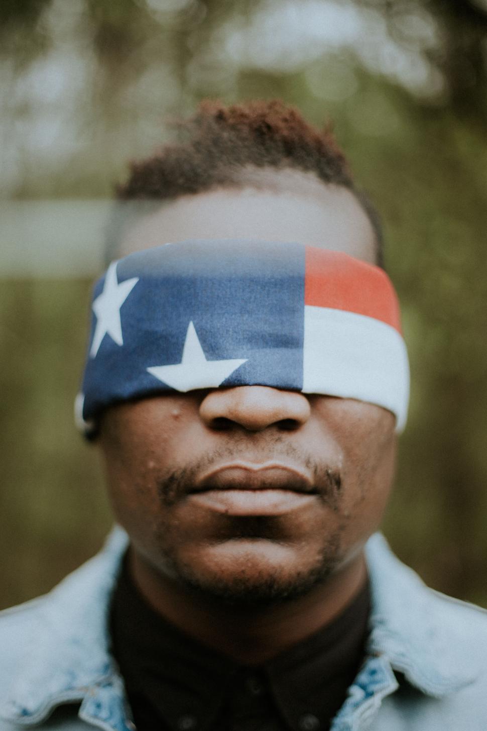 Free Image of Man Wearing Bandana With Flag Design 