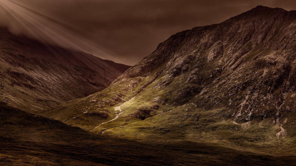 Free Image of Majestic Mountain Under Cloudy Sky 