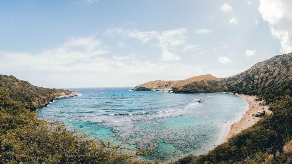 Free Image of Majestic Mountain Range Overlooking Body of Water 