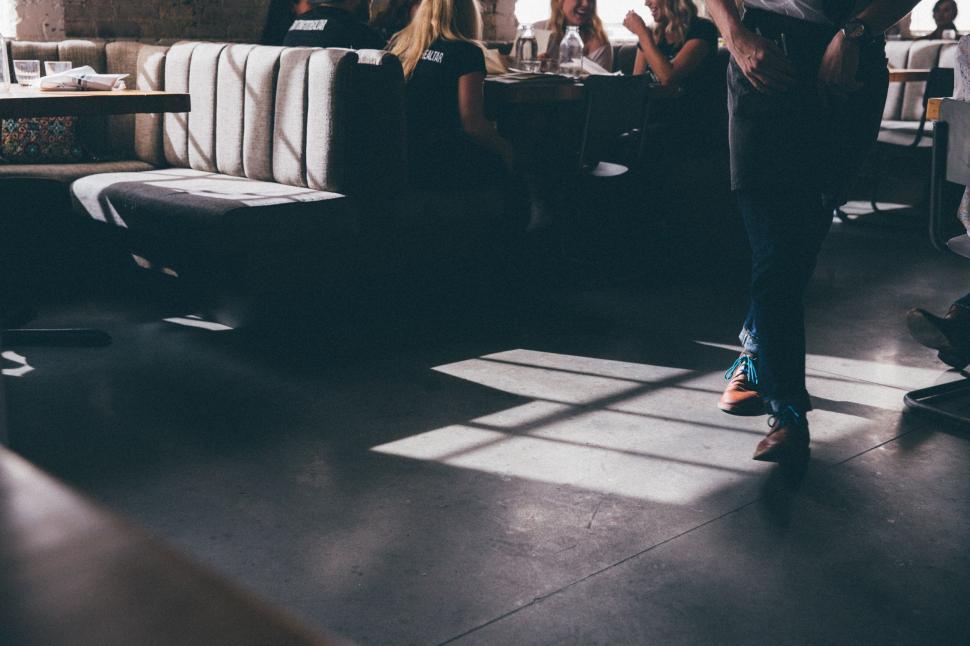 Free Image of Man Standing in Front of Group of People 