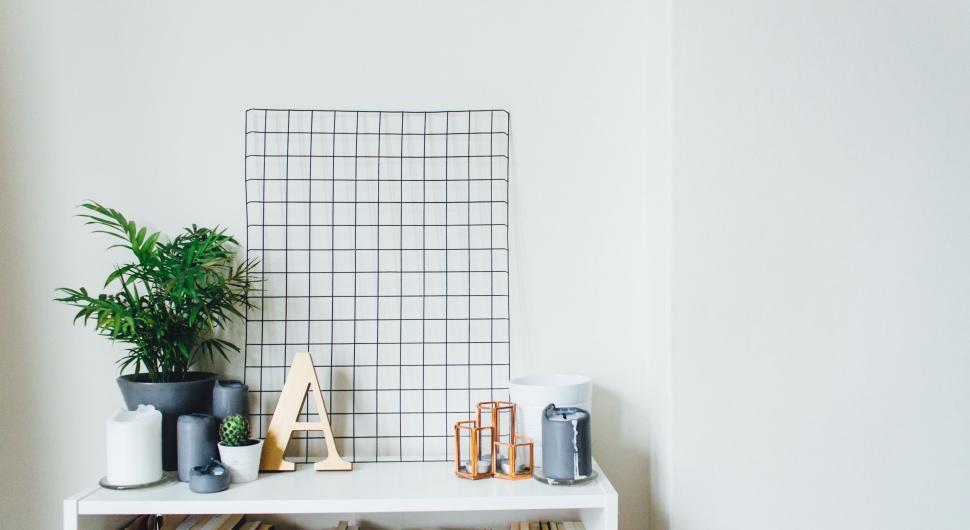 Free Image of Shelf With Plant and Letter 