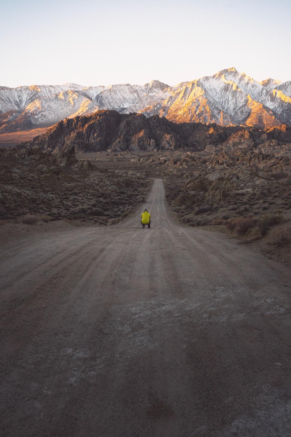 Free Image of Dirt Road Cutting Through Mountain Range 