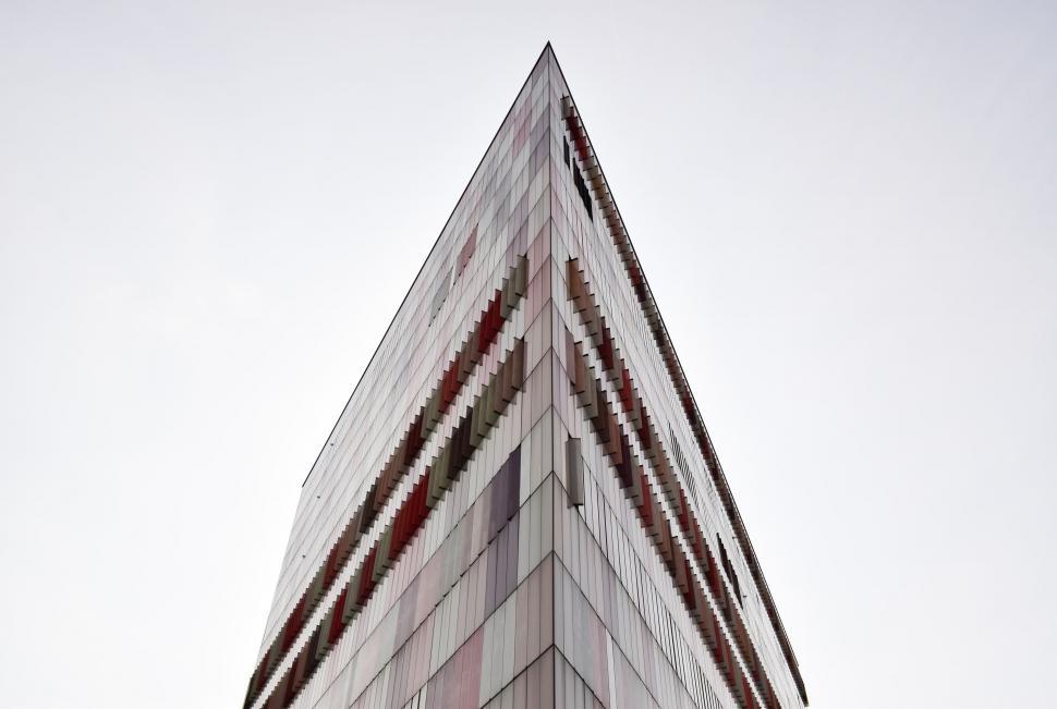 Free Image of Towering Building With Clock on Side 
