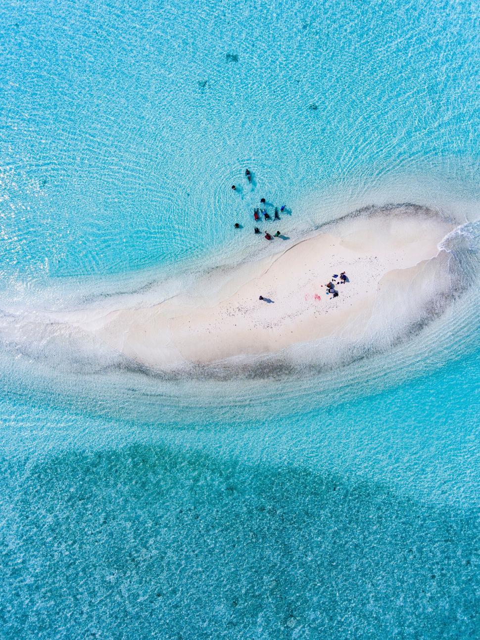 Free Image of Small Island in the Middle of a Body of Water 