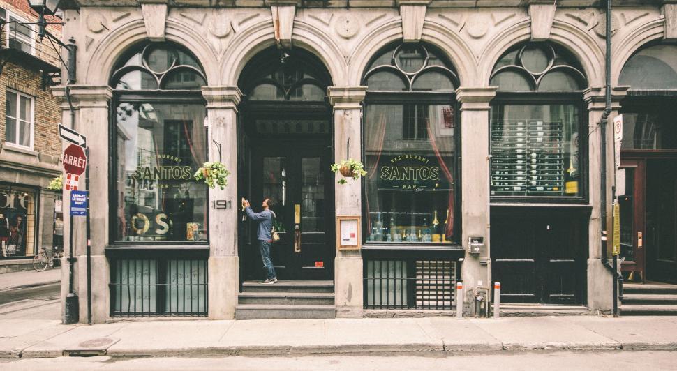 Free Image of Couple Standing in Front of Building 