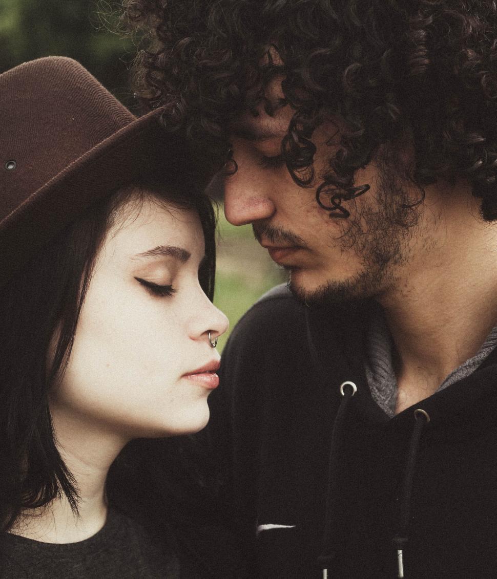 Free Image of Man and Woman Lock Eyes 