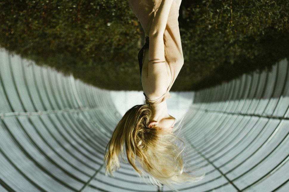 Free Image of Woman Performing Handstand on Skateboard 