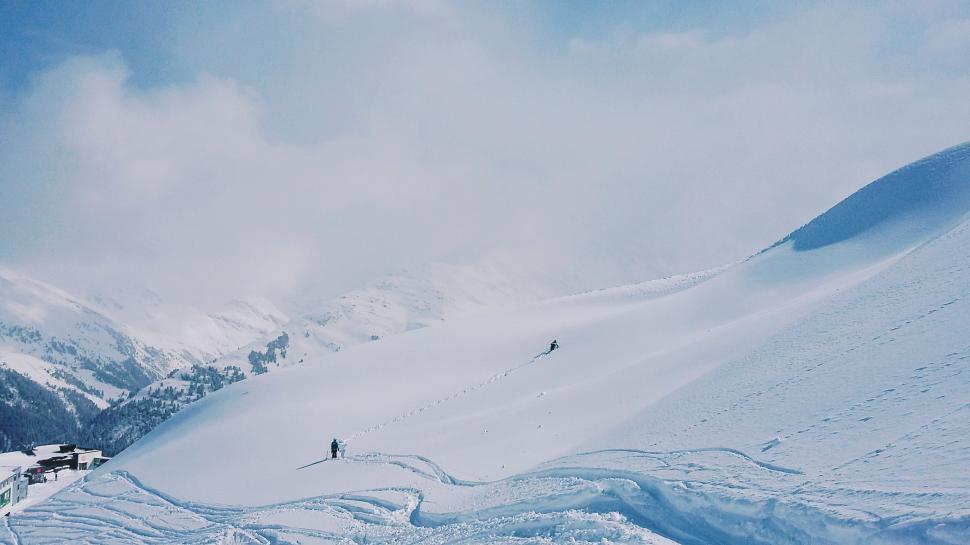 Free Image of Man Skiing Down Snowy Slope 