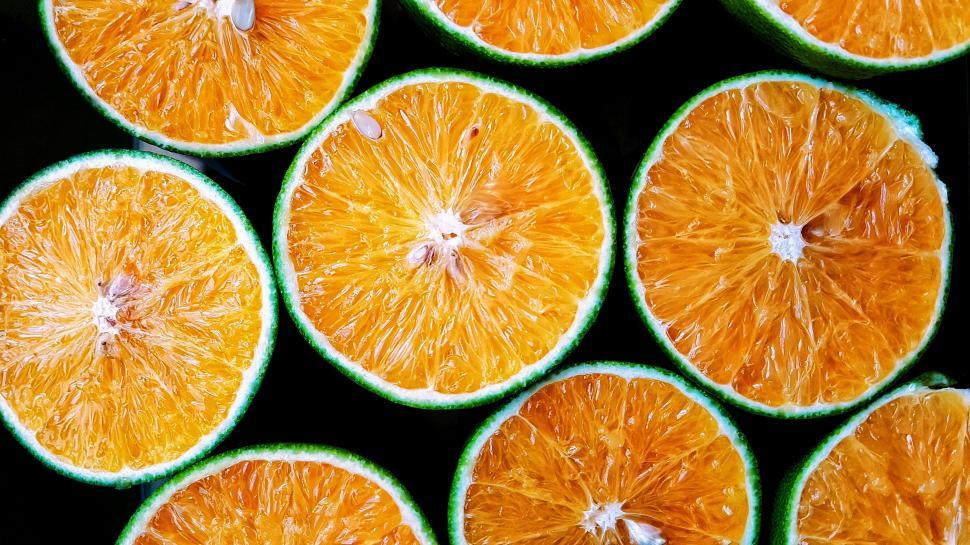 Free Image of Group of Halved Orange Slices 