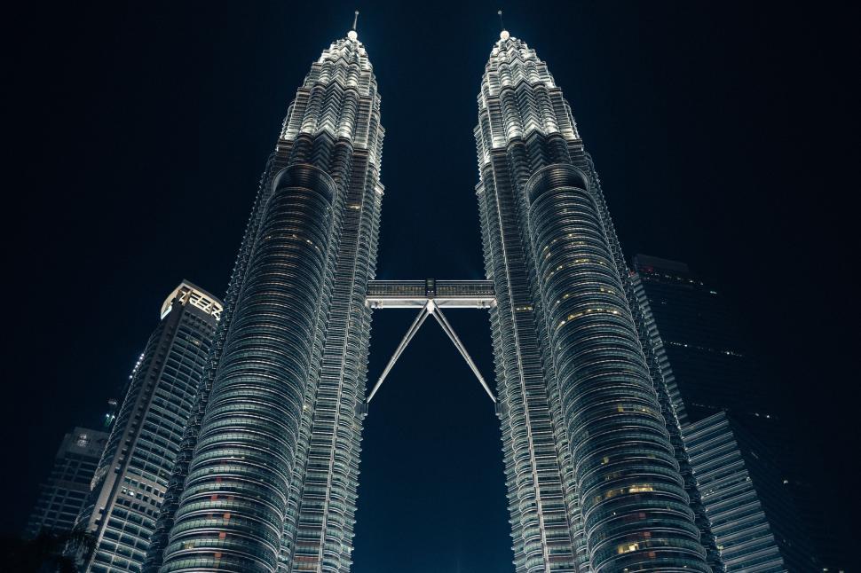 Free Image of Two Tall Buildings in Black and White 