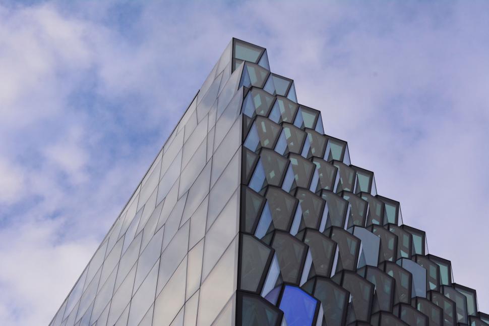 Free Image of Tall Building With Blue Arrow 