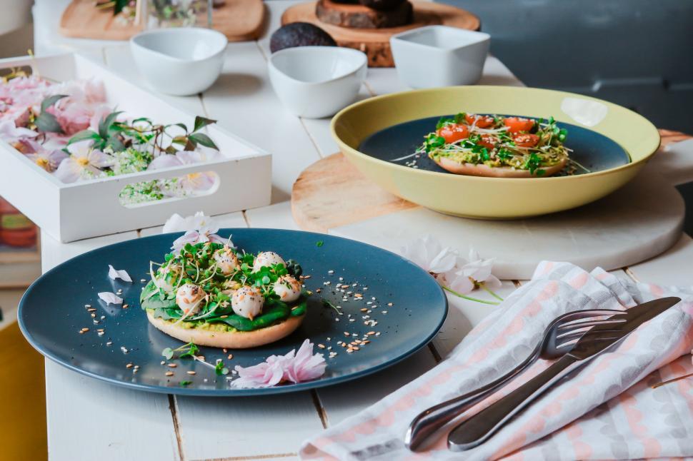 Free Image of Table Set With Plates and Bowls of Food 