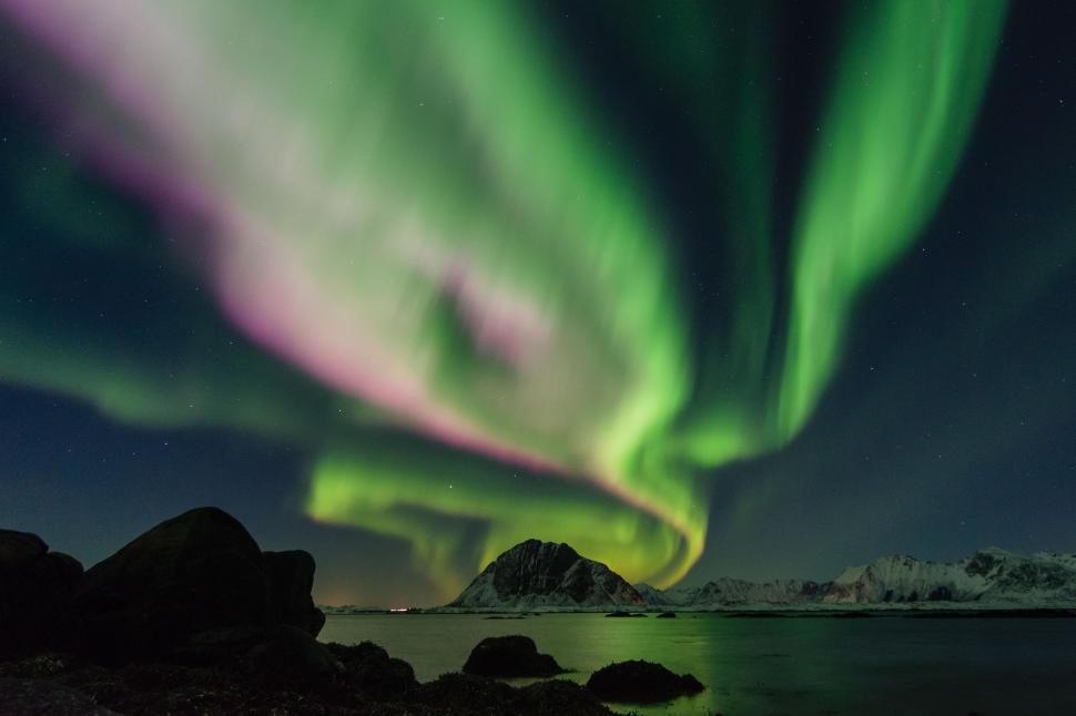 Free Image of Green and Purple Aurora Borealis Reflecting on Water 