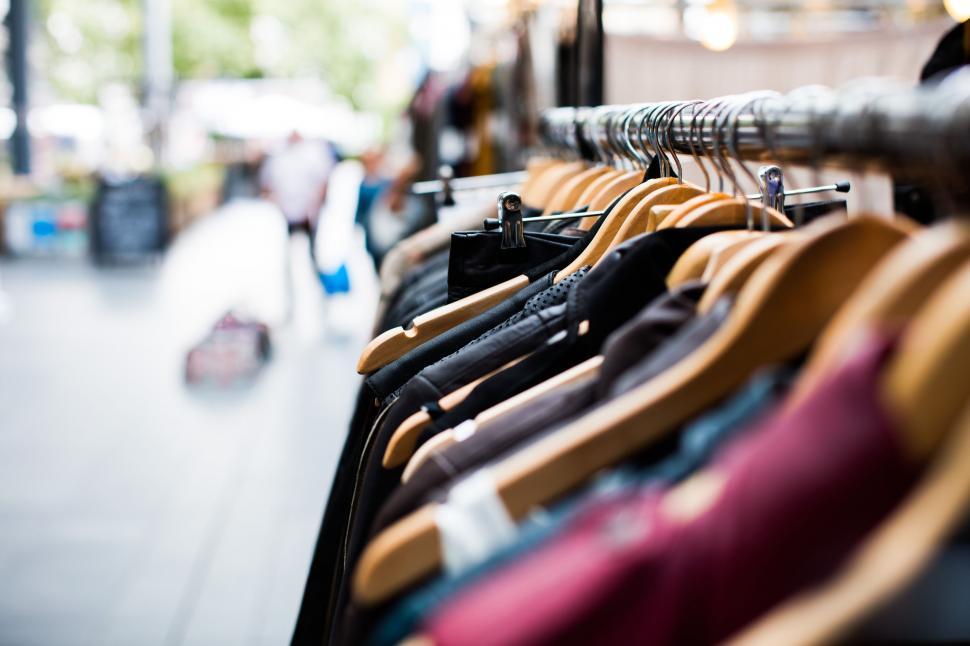 Free Image of Row of Clothes Hanging on a Rack 
