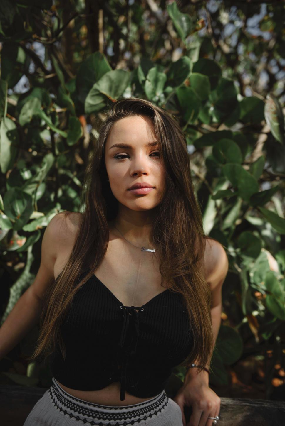 Free Image of Woman in Black Top Posing for a Picture 