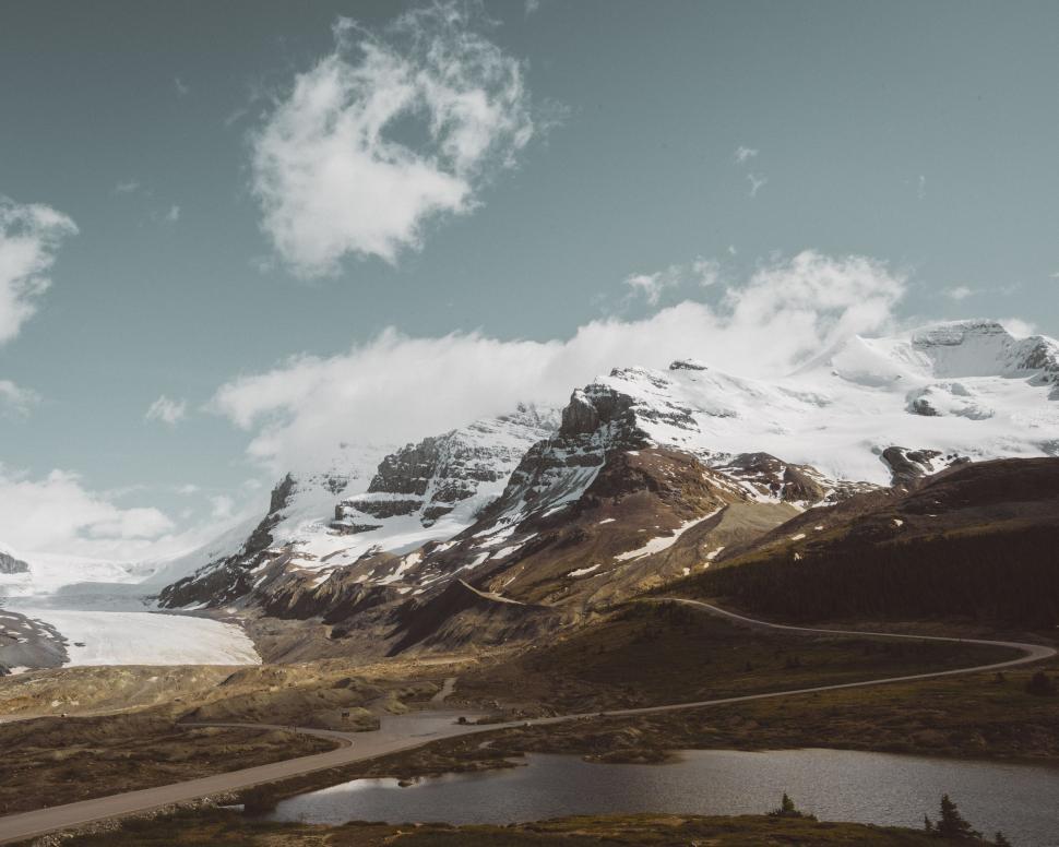 Free Image of Majestic Mountain Range Overlooking Lake 